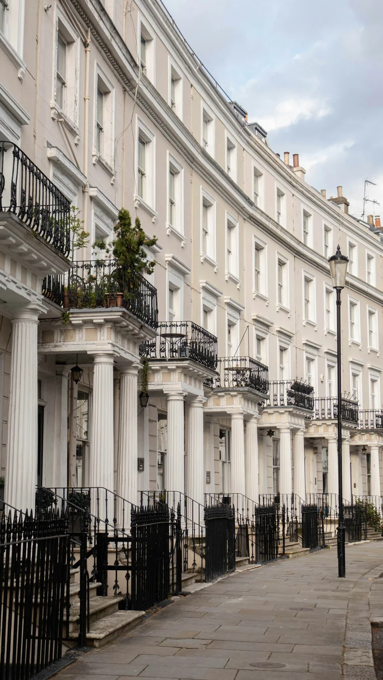 A London street of red-brick and white-stucco period houses