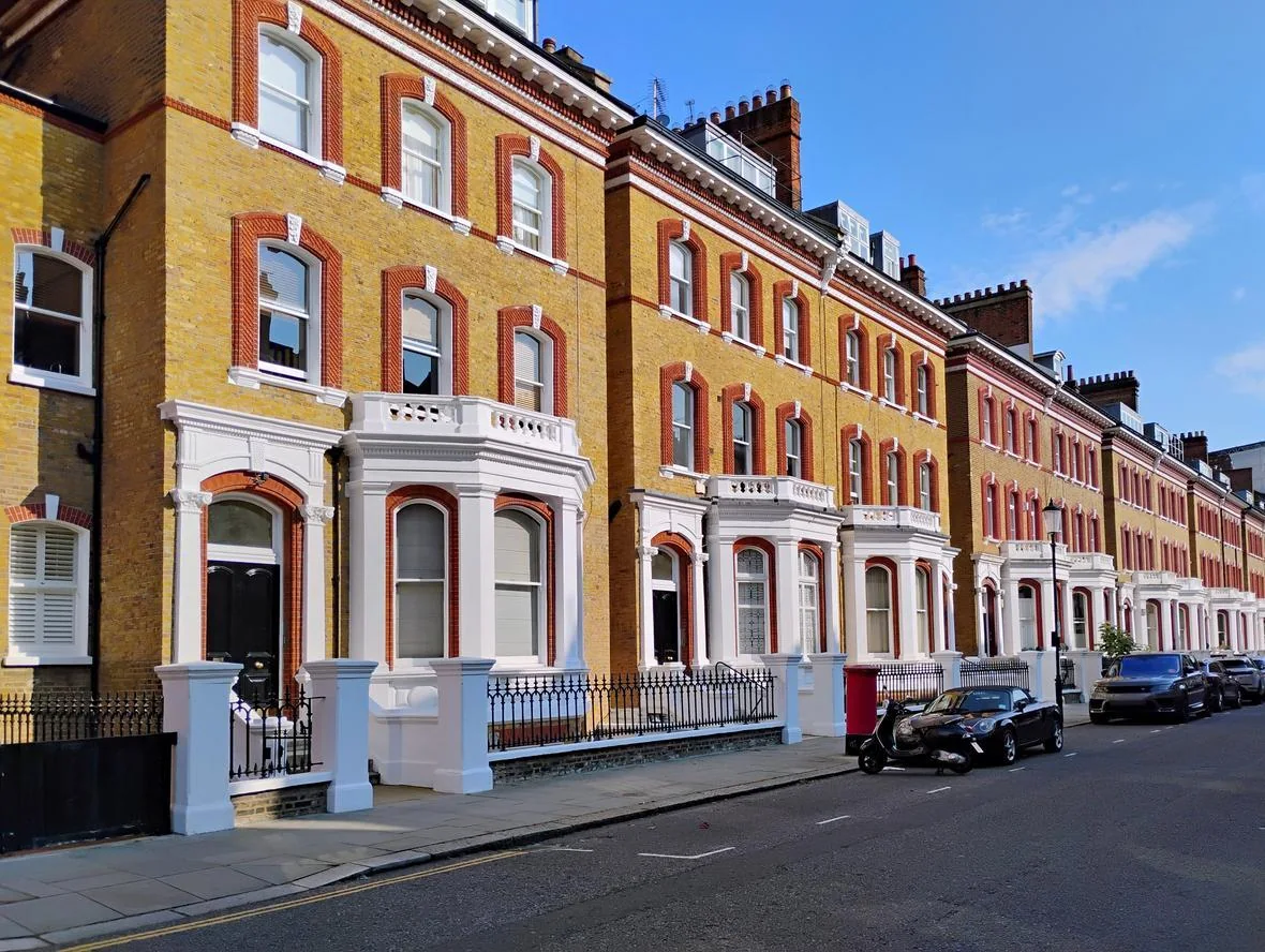 A tightly framed terrace of well-kept London period houses